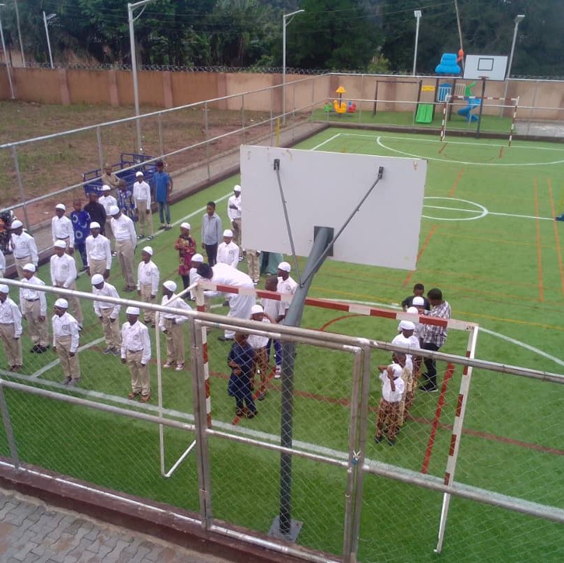 children lining up in the field